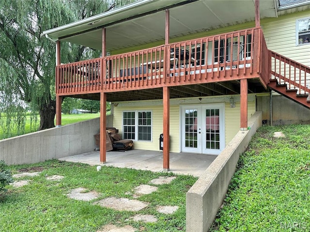 6624 State Route C, Saint Genevieve, MO 63670 - rear view of property with french doors, a deck, a patio, and a lawn
