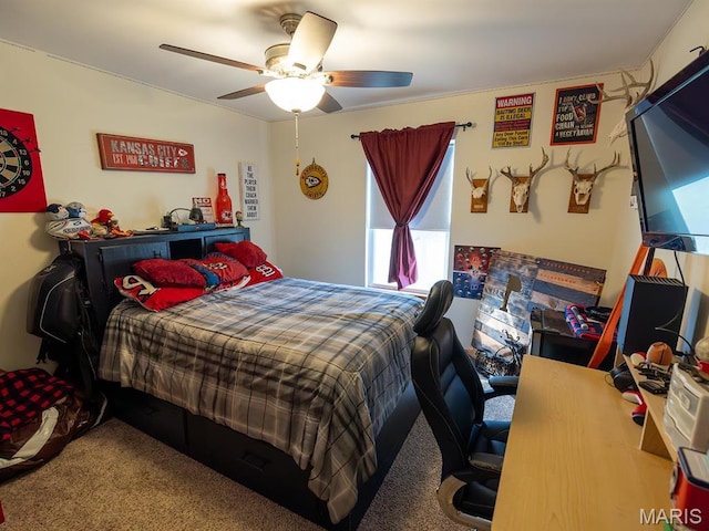 carpeted bedroom featuring a ceiling fan