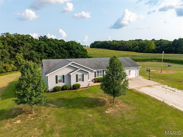 single story home with driveway and a front lawn
