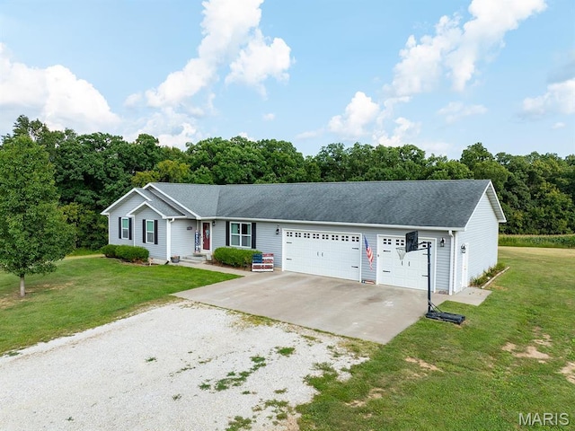 ranch-style house featuring gravel driveway, a garage, and a front lawn