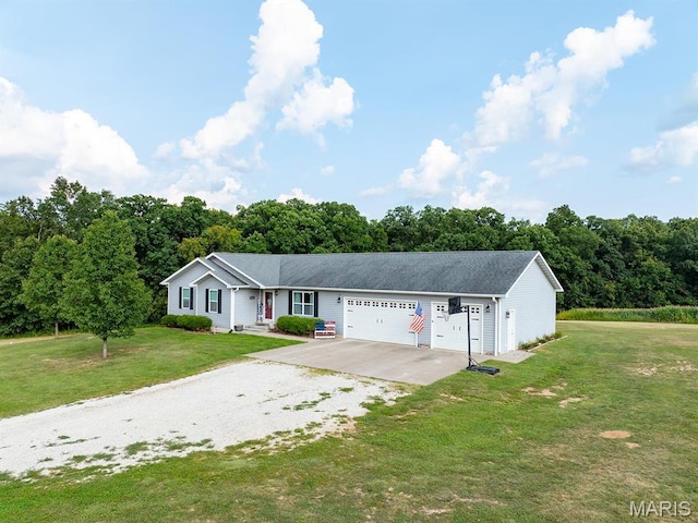 ranch-style home with gravel driveway, an attached garage, and a front yard