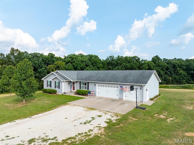 ranch-style home featuring dirt driveway, a front lawn, and a garage