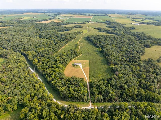 overview of rural landscape featuring a heavily wooded area