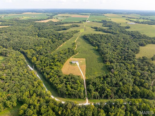 2700 Treetop Ln, Palmyra, MO 63461 - overview of rural landscape featuring a heavily wooded area