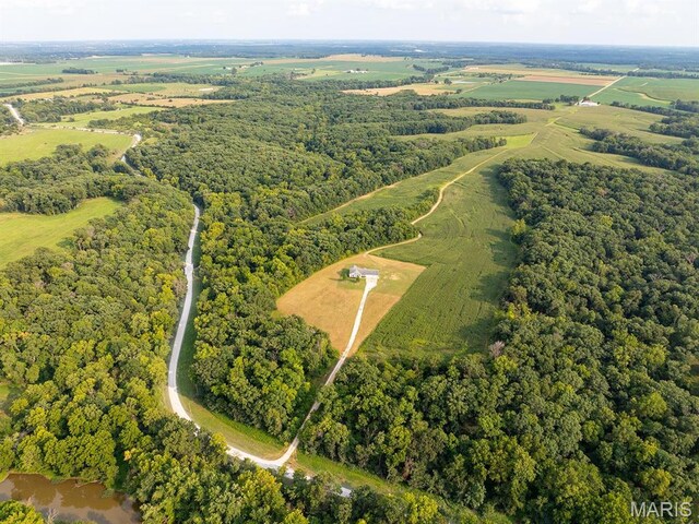 2700 Treetop Ln, Palmyra, MO 63461 - aerial view of property and surrounding area featuring a heavily wooded area