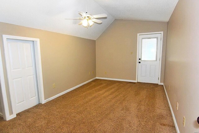bonus room featuring carpet, lofted ceiling, ceiling fan, and baseboards