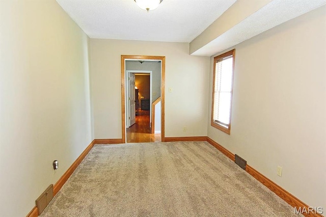 2110 Bainbridge Rd, Jackson, MO 63755 - spare room featuring carpet and baseboards