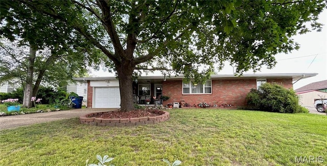 102 W Center St, Salem, MO 65560 - single story home with brick siding, an attached garage, a front yard, and concrete driveway