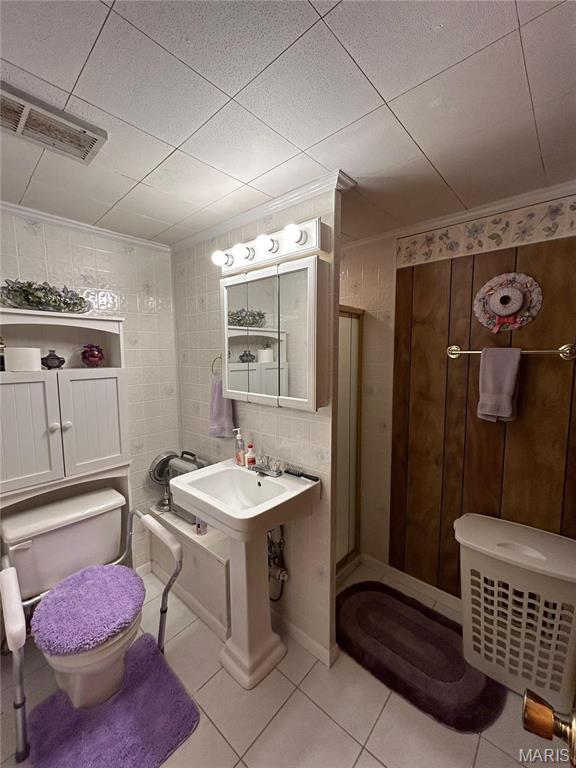 102 W Center St, Salem, MO 65560 - bathroom featuring tile patterned flooring and toilet