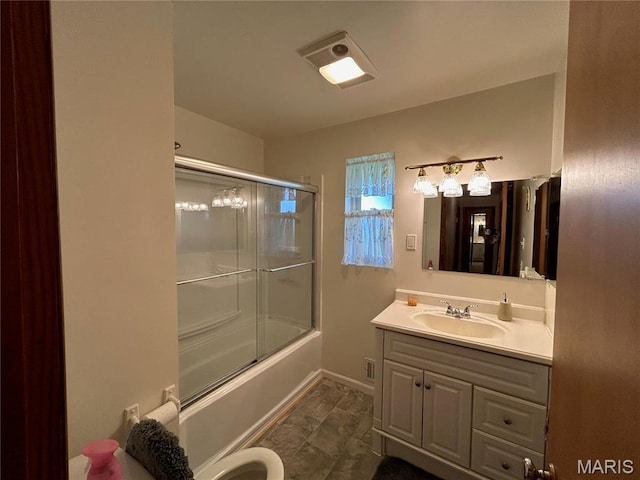 102 W Center St, Salem, MO 65560 - bathroom featuring vanity, bath / shower combo with glass door, and baseboards