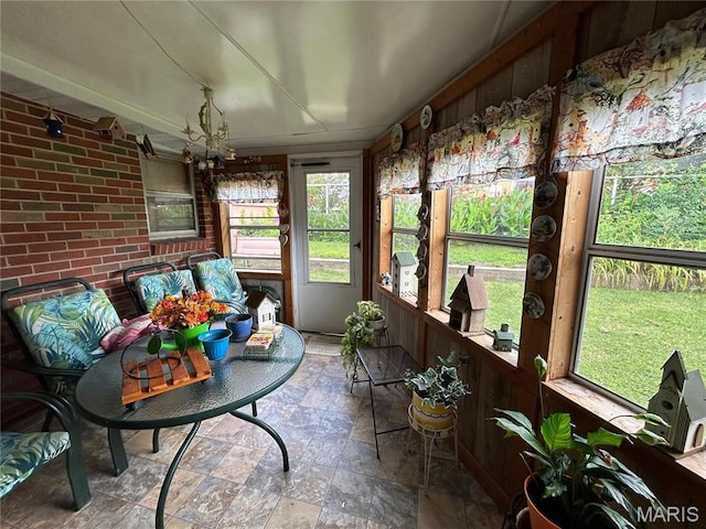 102 W Center St, Salem, MO 65560 - sunroom / solarium with stone finish floors and brick wall