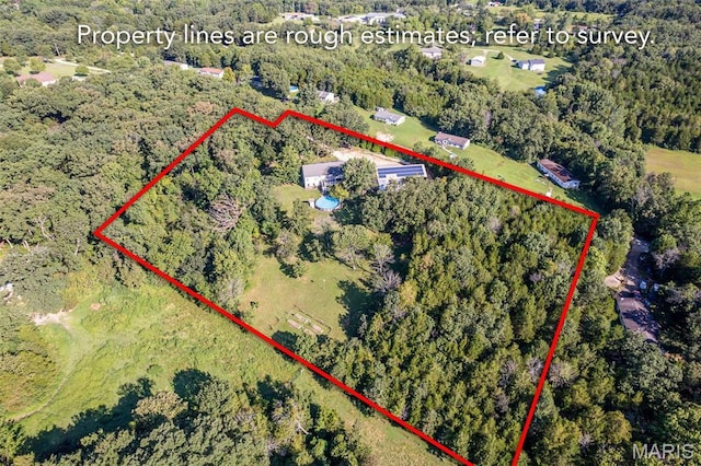 970 Lammert Ln, Union, MO 63084 - aerial view of property and surrounding area with property parcel outlined and a heavily wooded area