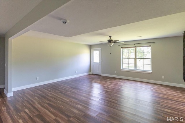129 Jared St, Waynesville, MO 65583 - empty room featuring dark wood-style floors, a smoke detector, and a ceiling fan