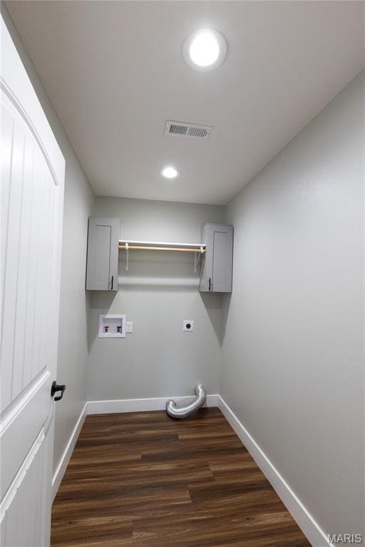 129 Jared St, Waynesville, MO 65583 - laundry area featuring electric dryer hookup, washer hookup, dark wood-type flooring, cabinet space, and recessed lighting
