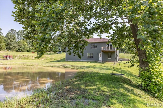 129 Jared St, Waynesville, MO 65583 - view of green lawn featuring a deck with water view