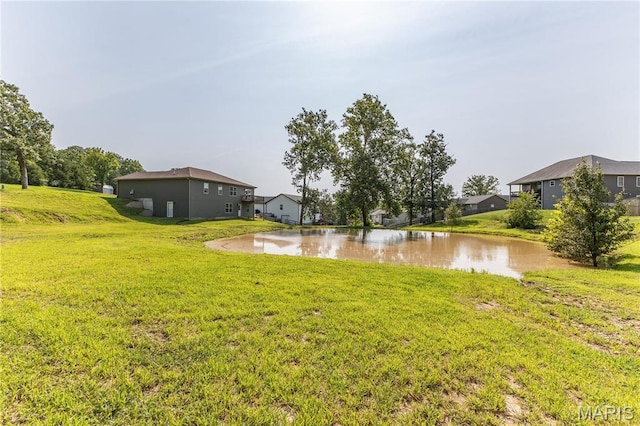 129 Jared St, Waynesville, MO 65583 - view of green lawn featuring a water view
