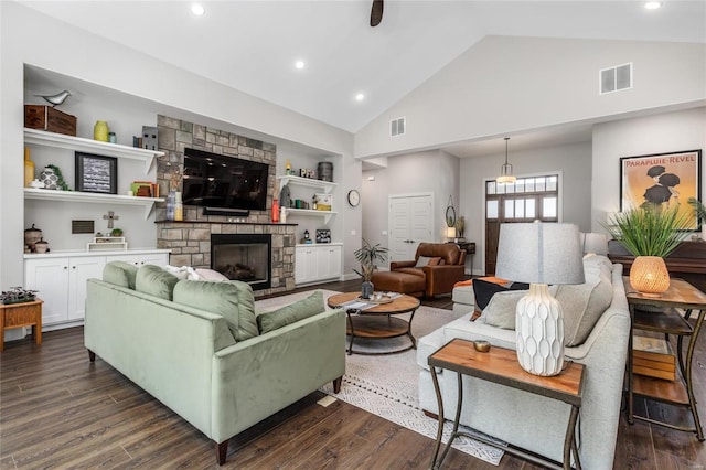 128 Jared St, Waynesville, MO 65583 - living area featuring high vaulted ceiling, a fireplace, dark wood finished floors, recessed lighting, and built in shelves