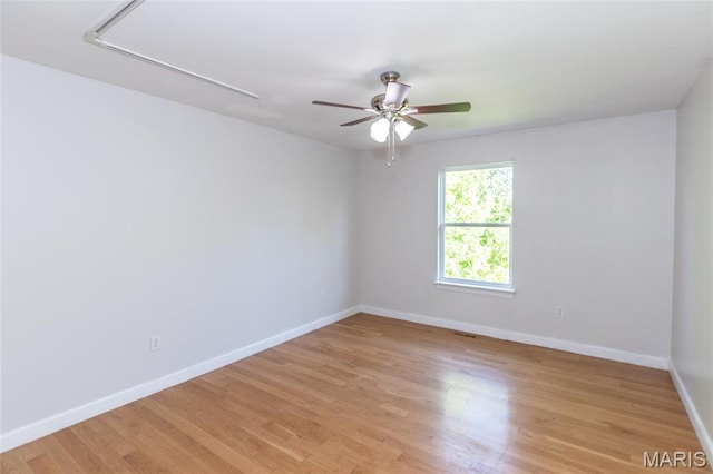 1010 Winter Lake Dr, Fenton, MO 63026 - unfurnished room featuring attic access, baseboards, ceiling fan, and light wood finished floors
