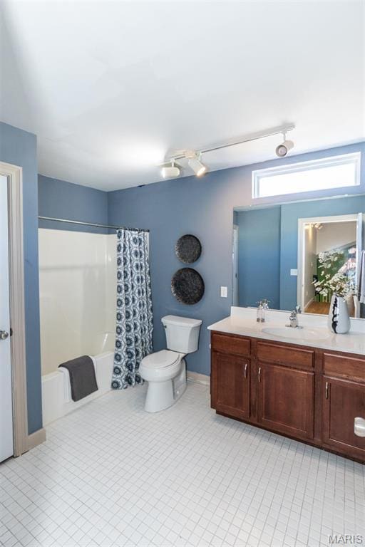 1010 Winter Lake Dr, Fenton, MO 63026 - bathroom featuring shower / bath combination with curtain, vanity, and toilet
