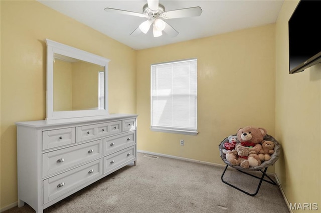 12063 Trampe Heights Ln, Saint Louis, MO 63138 - bedroom featuring light carpet, baseboards, and a ceiling fan