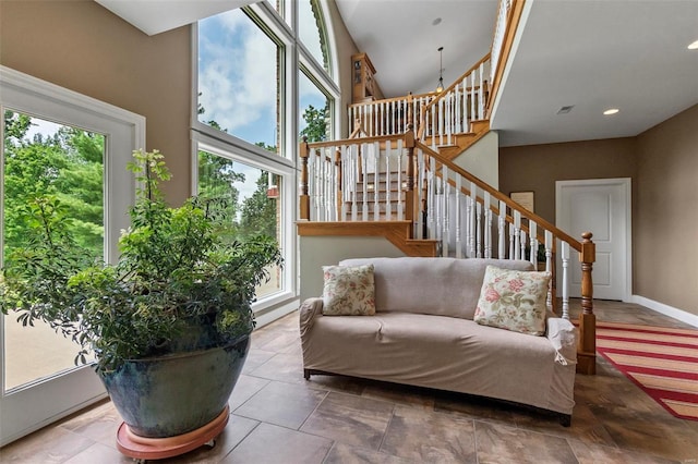 472 Ridgefield Dr, Cape Girardeau, MO 63701 - living room featuring stairs, baseboards, and recessed lighting