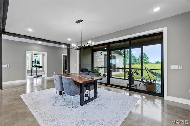 173 Tate Rdg, Cape Girardeau, MO 63701 - dining space with finished concrete floors, recessed lighting, and a chandelier