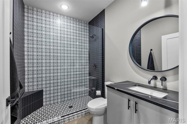 173 Tate Rdg, Cape Girardeau, MO 63701 - bathroom featuring tiled shower and vanity