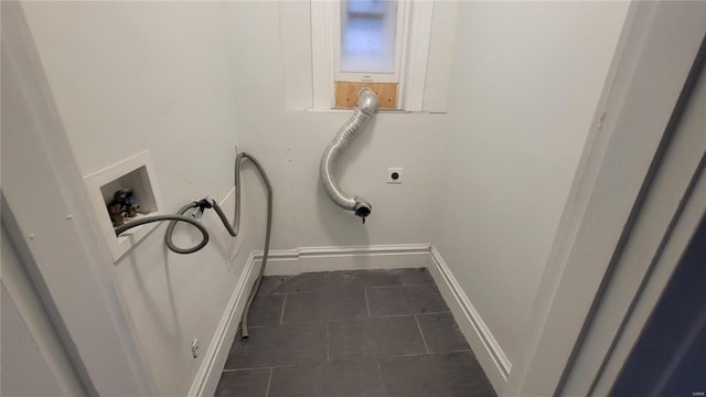 3253 Texas Ave, Saint Louis, MO 63118 - washroom featuring hookup for a washing machine, tile patterned floors, baseboards, and hookup for an electric dryer