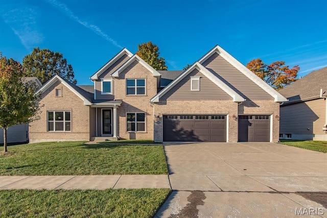 2708 Brook Hill Ln, Saint Charles, MO 63303 - view of front of home with concrete driveway, brick siding, a garage, and a front yard