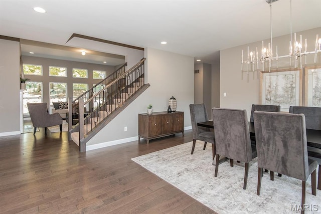 2708 Brook Hill Ln, Saint Charles, MO 63303 - dining room featuring wood finished floors, a chandelier, baseboards, recessed lighting, and stairway