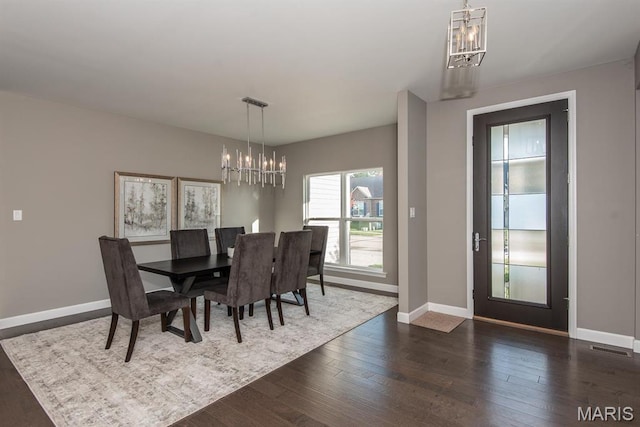 2708 Brook Hill Ln, Saint Charles, MO 63303 - dining area featuring a chandelier, baseboards, and dark wood-style flooring