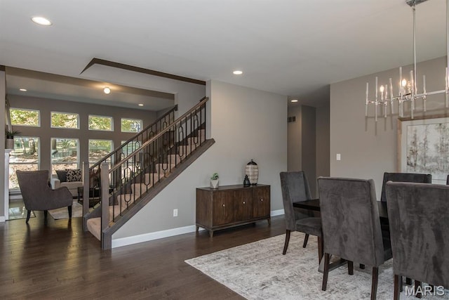 2708 Brook Hill Ln, Saint Charles, MO 63303 - dining area featuring a chandelier, recessed lighting, wood finished floors, baseboards, and stairs