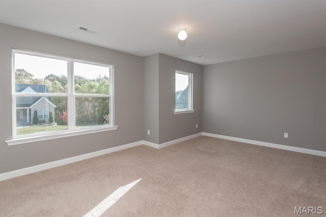 2708 Brook Hill Ln, Saint Charles, MO 63303 - empty room featuring light colored carpet and baseboards