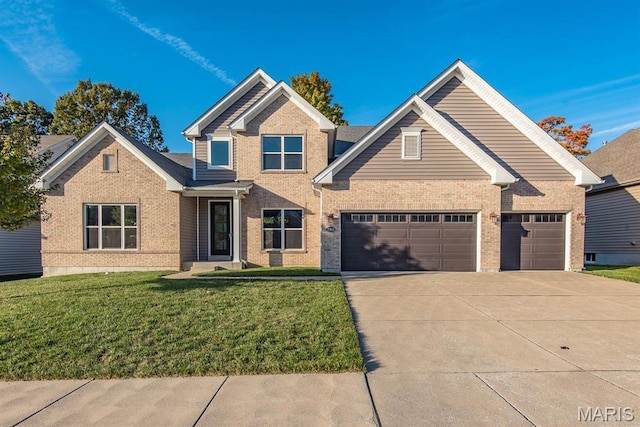 2708 Brook Hill Ln, Saint Charles, MO 63303 - view of front of property featuring driveway, brick siding, a front yard, and an attached garage