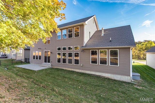 2708 Brook Hill Ln, Saint Charles, MO 63303 - back of house with a patio area and roof with shingles