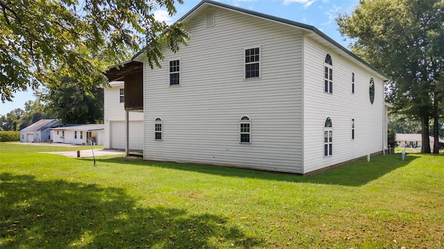 10912 State Highway 77, Chaffee, MO 63740 - view of side of property featuring a garage and a yard