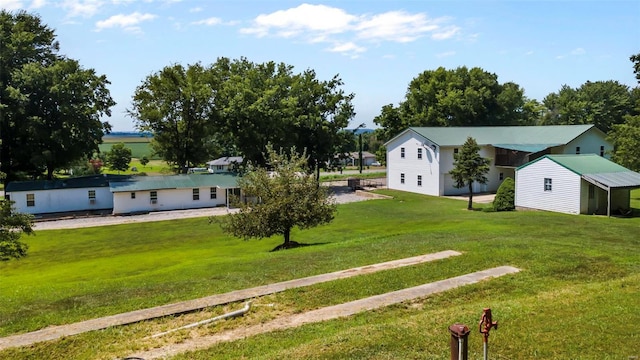 10912 State Highway 77, Chaffee, MO 63740 - view of green lawn featuring an outdoor structure