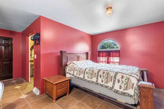 10912 State Highway 77, Chaffee, MO 63740 - tiled bedroom featuring baseboards