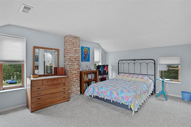 7102 Shadow Ln, Villa Ridge, MO 63089 - bedroom featuring vaulted ceiling, multiple windows, carpet flooring, and baseboards