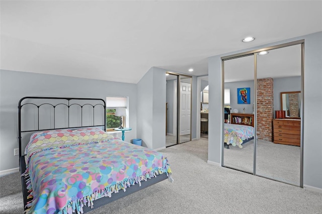7102 Shadow Ln, Villa Ridge, MO 63089 - bedroom with carpet, multiple closets, baseboards, and recessed lighting