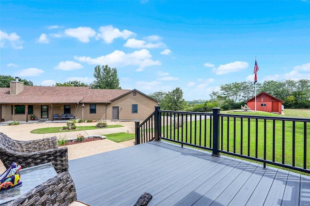 7102 Shadow Ln, Villa Ridge, MO 63089 - wooden terrace featuring a yard and a patio area