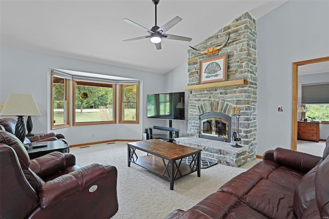 7102 Shadow Ln, Villa Ridge, MO 63089 - living room featuring carpet floors, a ceiling fan, high vaulted ceiling, baseboards, and a stone fireplace