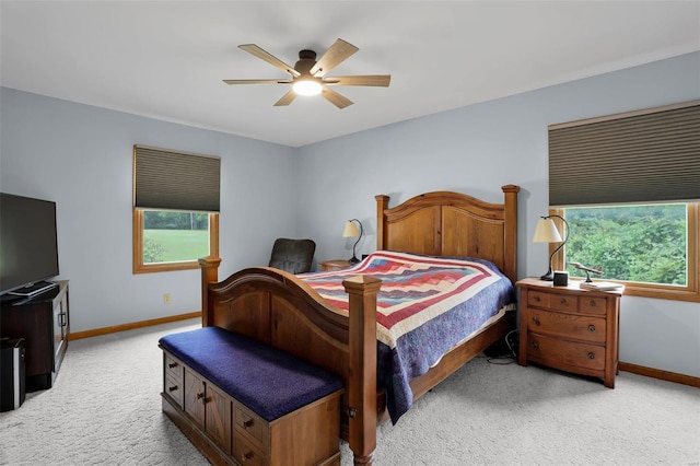 7102 Shadow Ln, Villa Ridge, MO 63089 - bedroom featuring light colored carpet, multiple windows, and baseboards