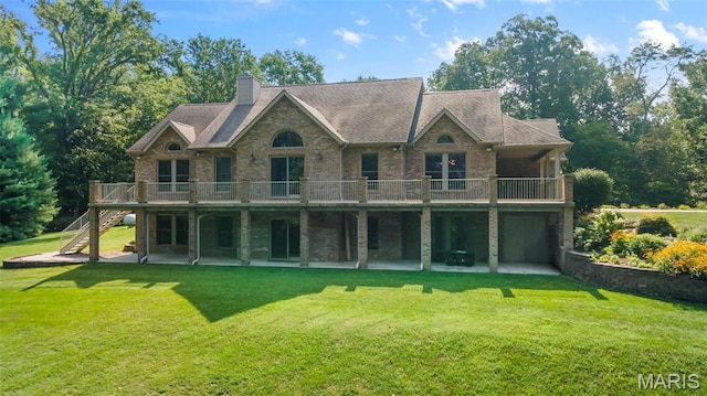 304 Timberlake Ln, Cape Girardeau, MO 63701 - rear view of property featuring stairs, a patio, a yard, and a wooden deck
