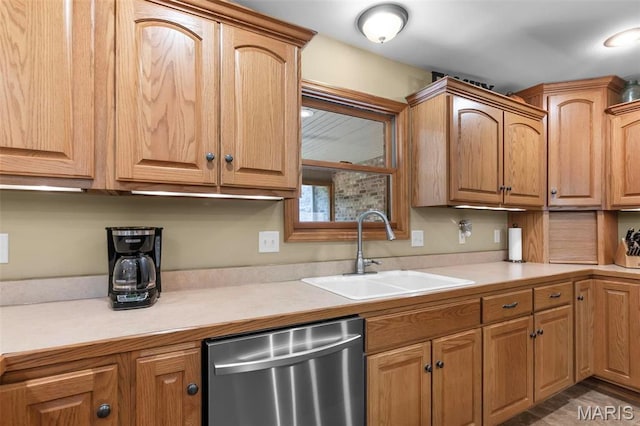304 Timberlake Ln, Cape Girardeau, MO 63701 - kitchen featuring dishwasher, a sink, and light countertops