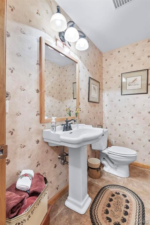 304 Timberlake Ln, Cape Girardeau, MO 63701 - half bath featuring tile patterned flooring and toilet