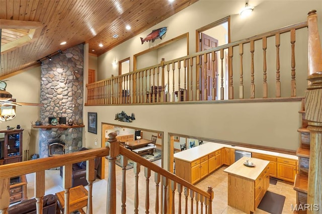 304 Timberlake Ln, Cape Girardeau, MO 63701 - staircase featuring tile patterned flooring, wood ceiling, recessed lighting, and high vaulted ceiling