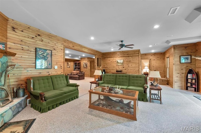 304 Timberlake Ln, Cape Girardeau, MO 63701 - living room featuring wooden walls, ceiling fan, carpet floors, and recessed lighting