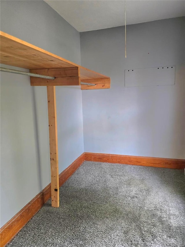 basement with carpet and baseboards