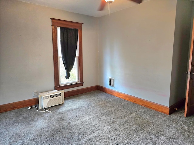unfurnished room featuring carpet flooring, baseboards, and a ceiling fan
